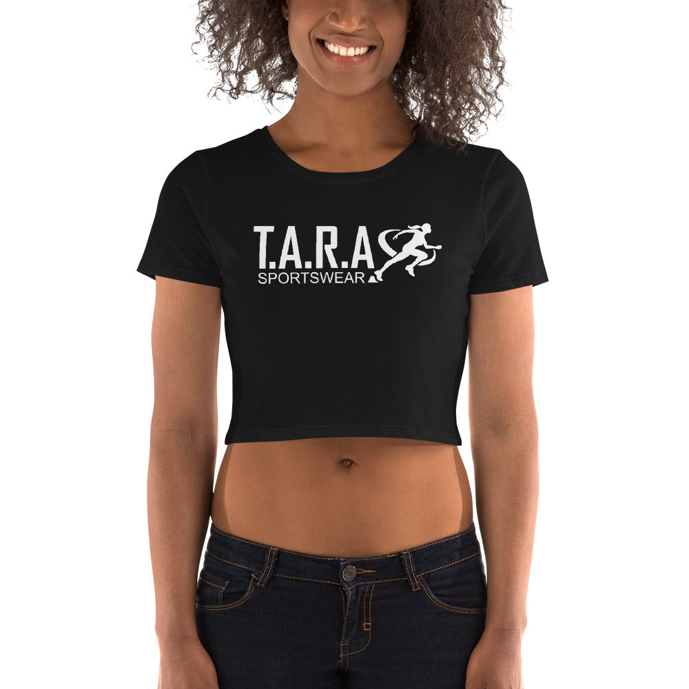 A woman is wearing a black crop top with the text 'T.A.R.A Sportswear' printed on the front.