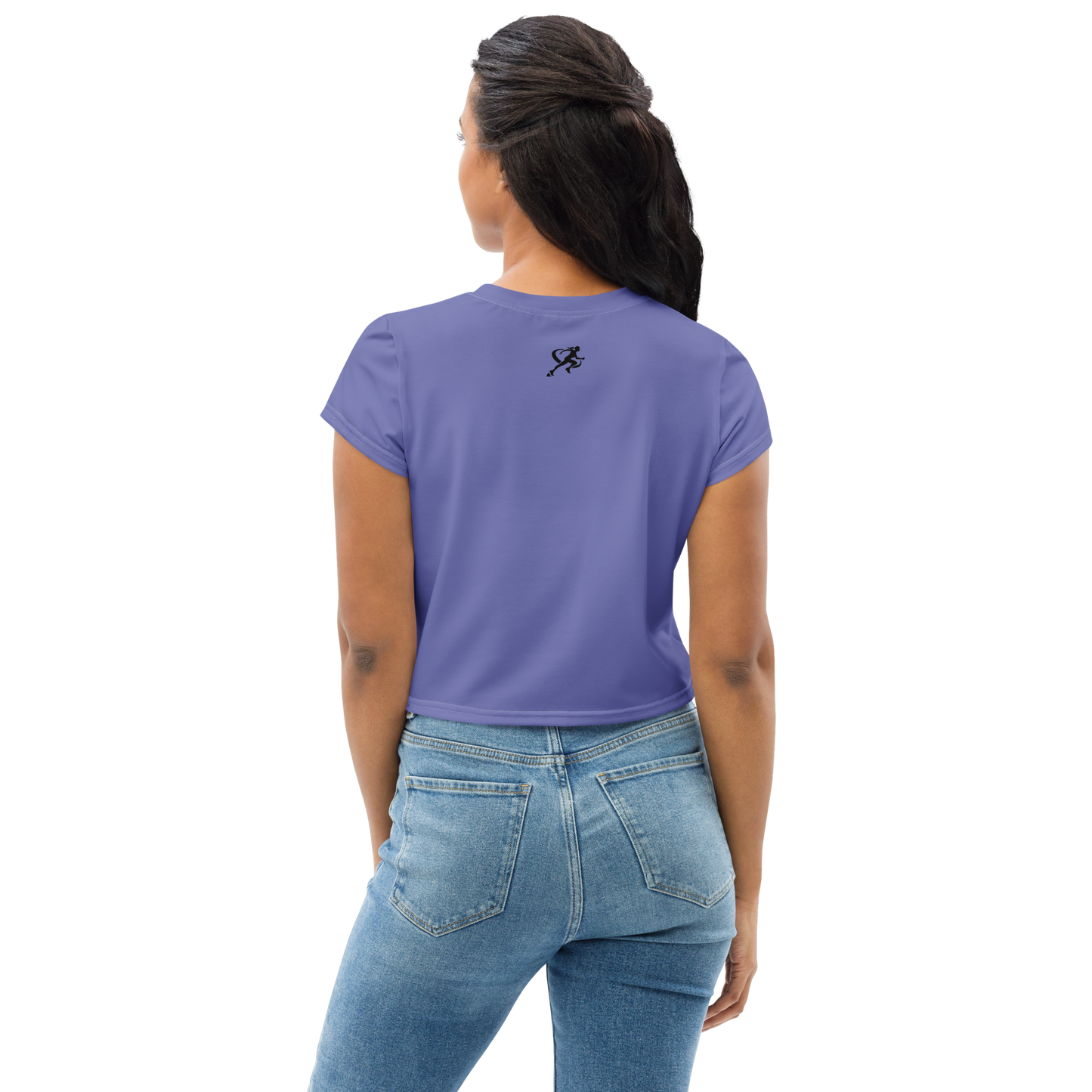 Woman wearing a purple t-shirt and blue jeans on a white background