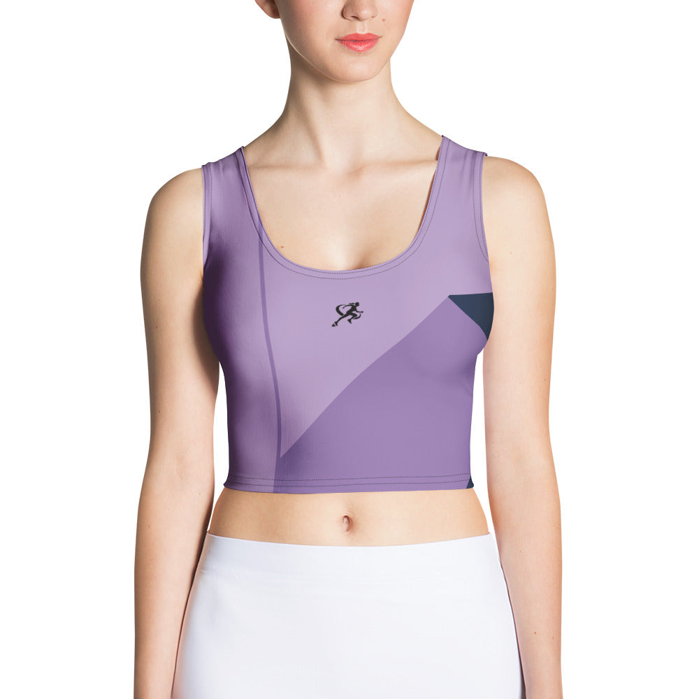 Woman wearing a purple tank top and white jeans on a white background