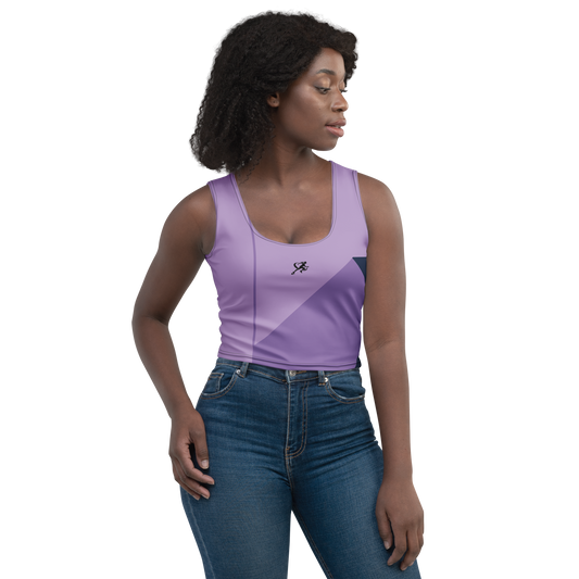 Woman wearing a purple tank top and blue jeans on a white background