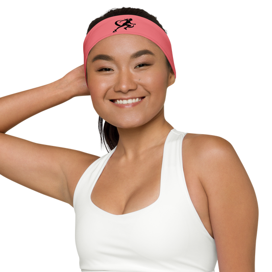 Woman wearing a pink headband with a logo on a white background