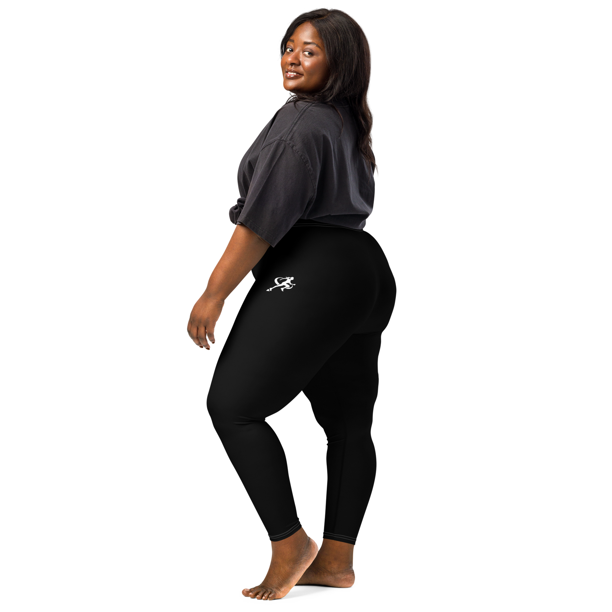 Person wearing black leggings with a logo on a white background
