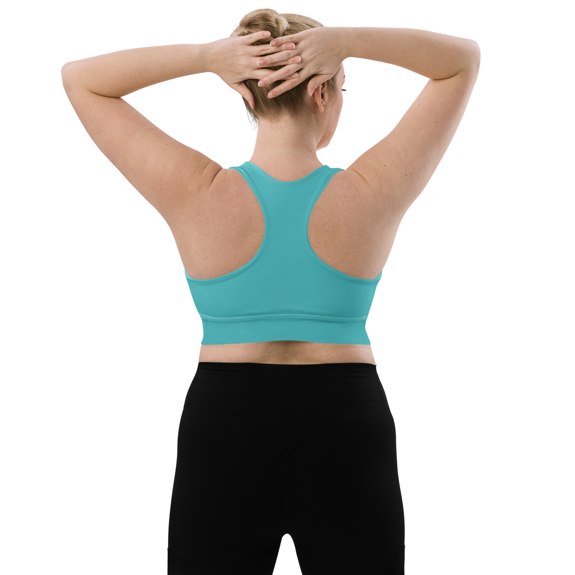 Woman wearing a turquoise sports bra with a logo on a white background