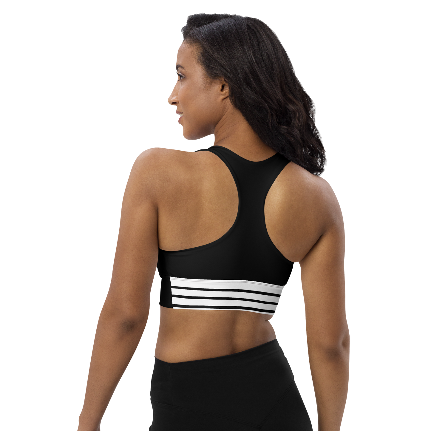 Woman wearing a black sports bra with a logo on a white background