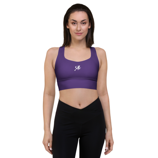 Woman wearing a purple sports bra with a logo on a white background
