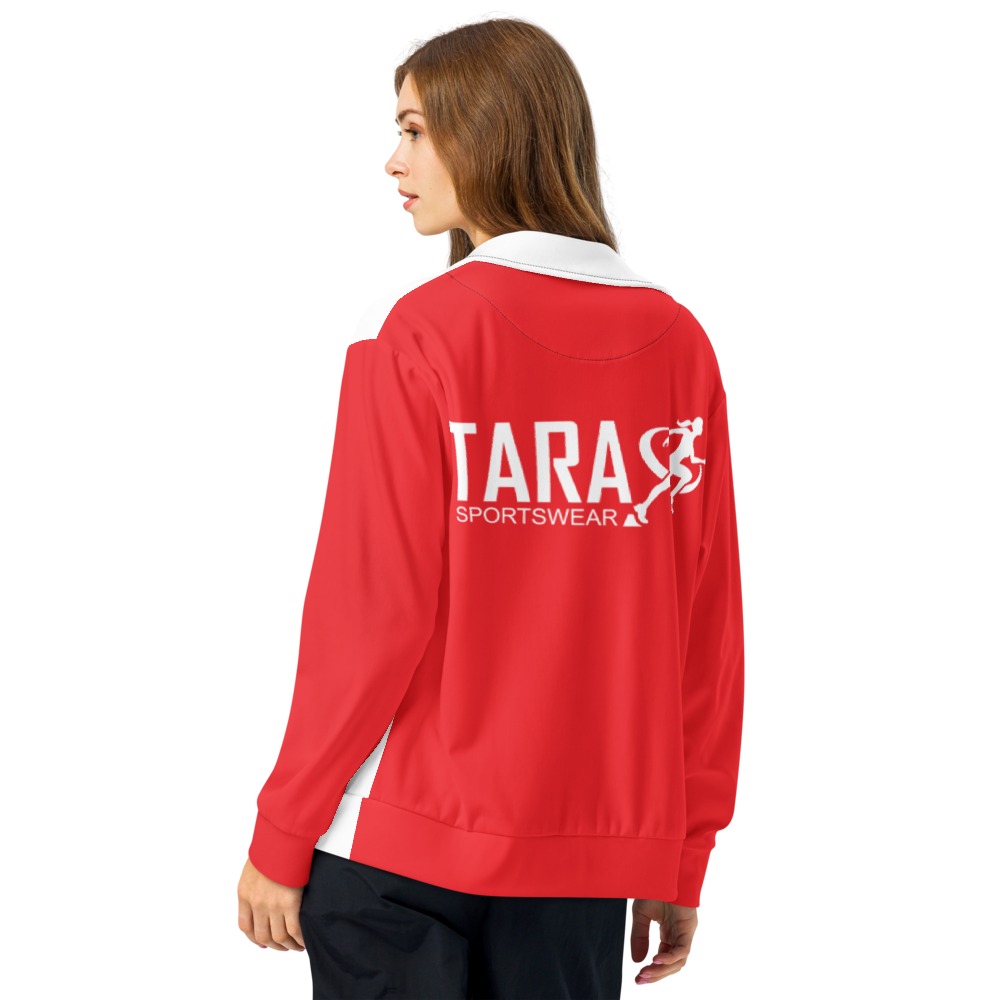 A woman standing wearing white and red T.A.R.A Sportswear Classic Gym Jacket with black logos on the back