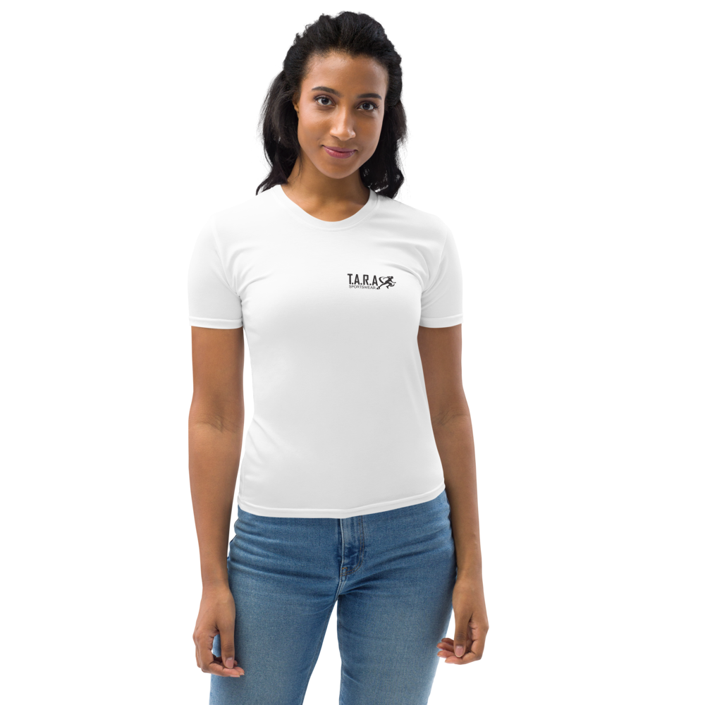 A woman wearing a white crew neck t-shirt with 'T.A.R.A' brand logo printed on the front.