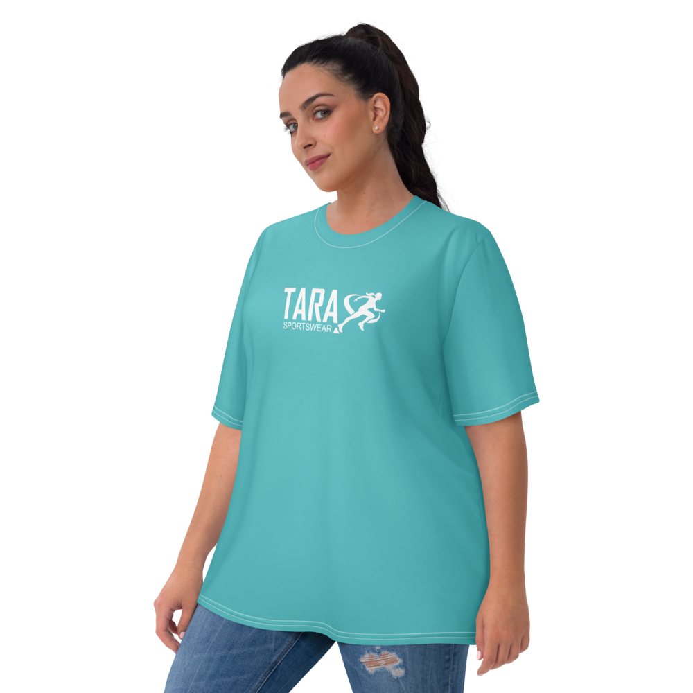 Woman wearing a teal t-shirt with 'TARA' logo on a white background