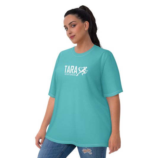 Woman wearing a teal t-shirt with 'TARA' logo on a white background