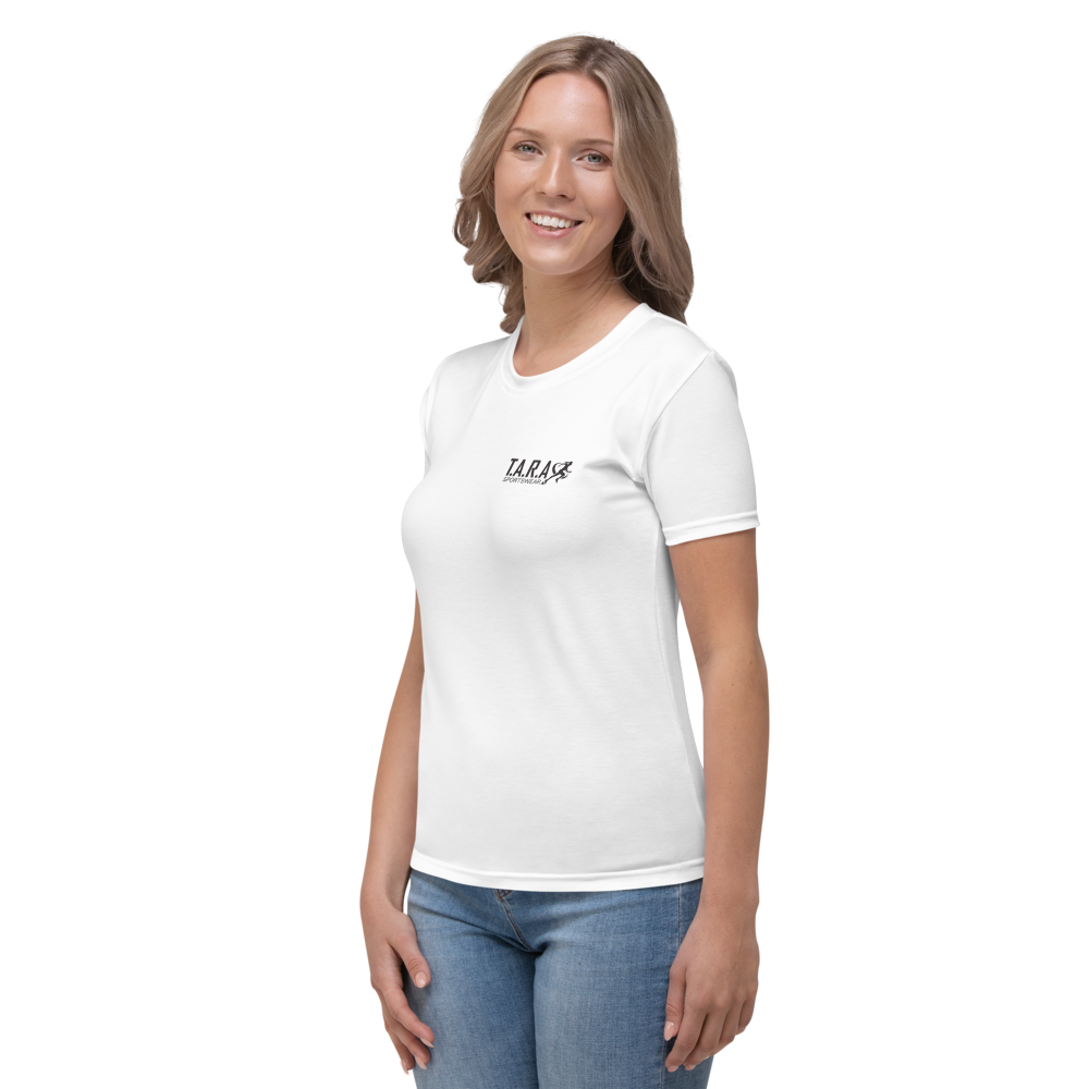 A woman wearing a white crew neck t-shirt with 'T.A.R.A' brand logo printed on the front.