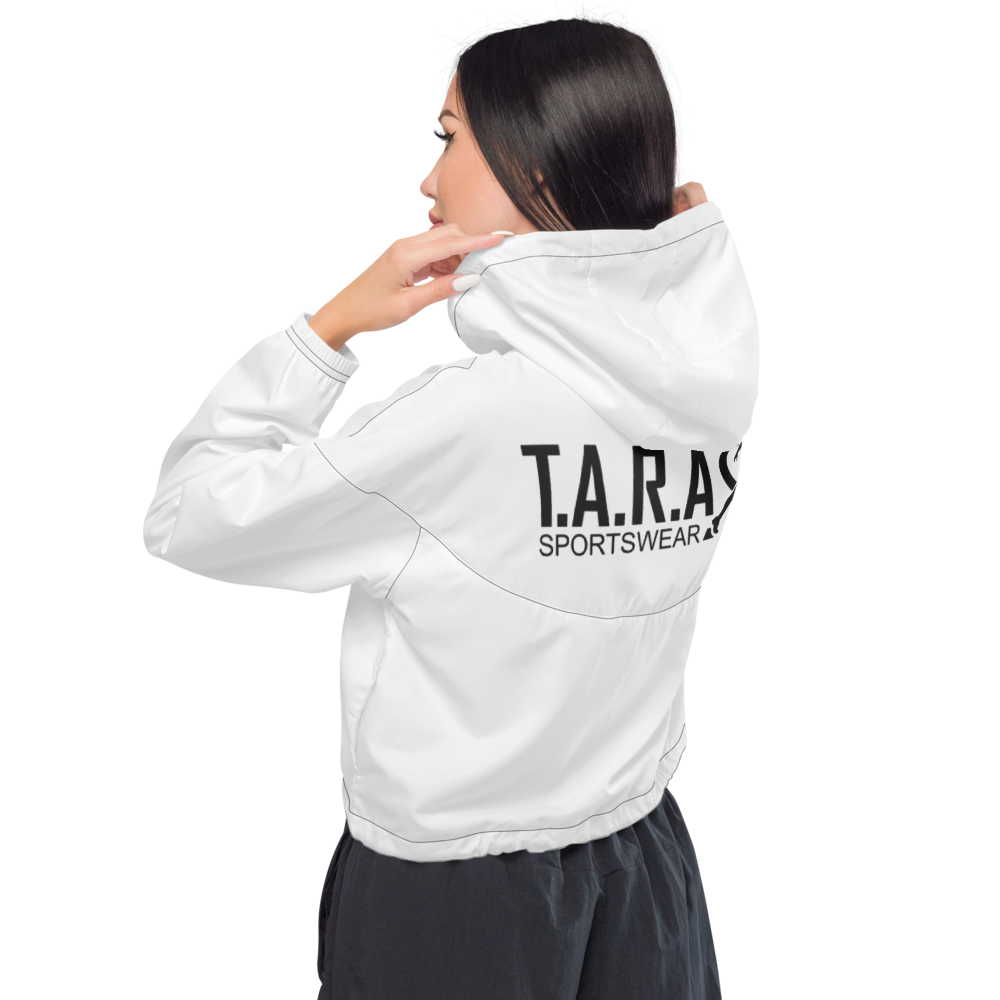 Person wearing a white jacket and black leggings on a white background