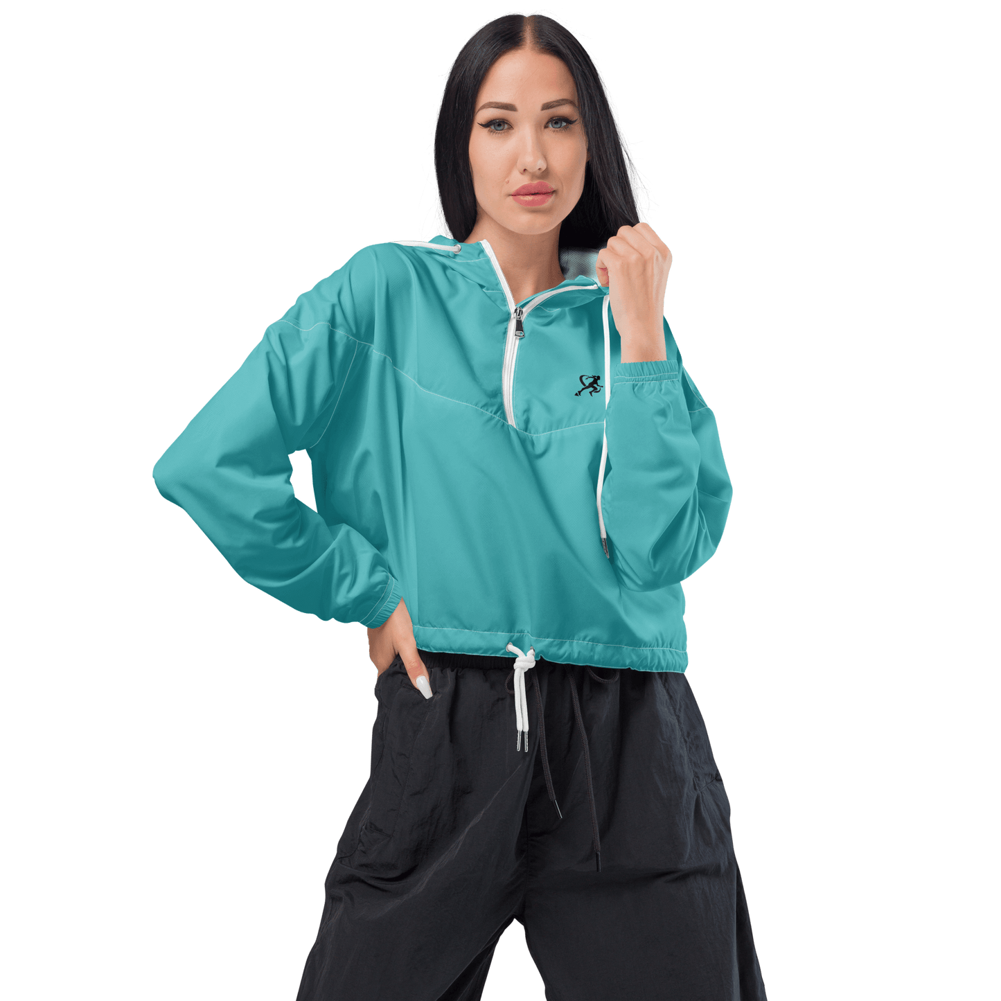 Woman wearing a turquoise jacket and black pants on a white background