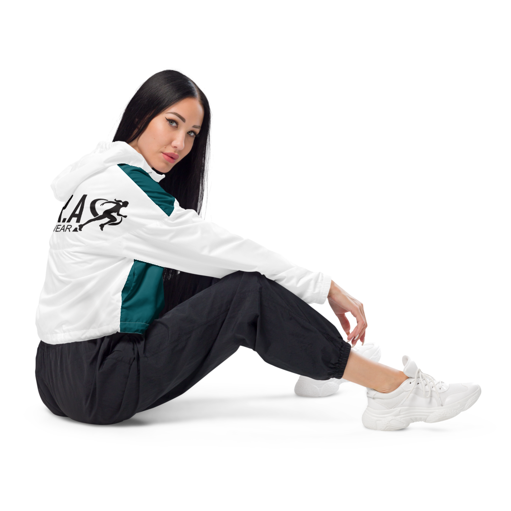 Person wearing a white jacket and black leggings on a white background