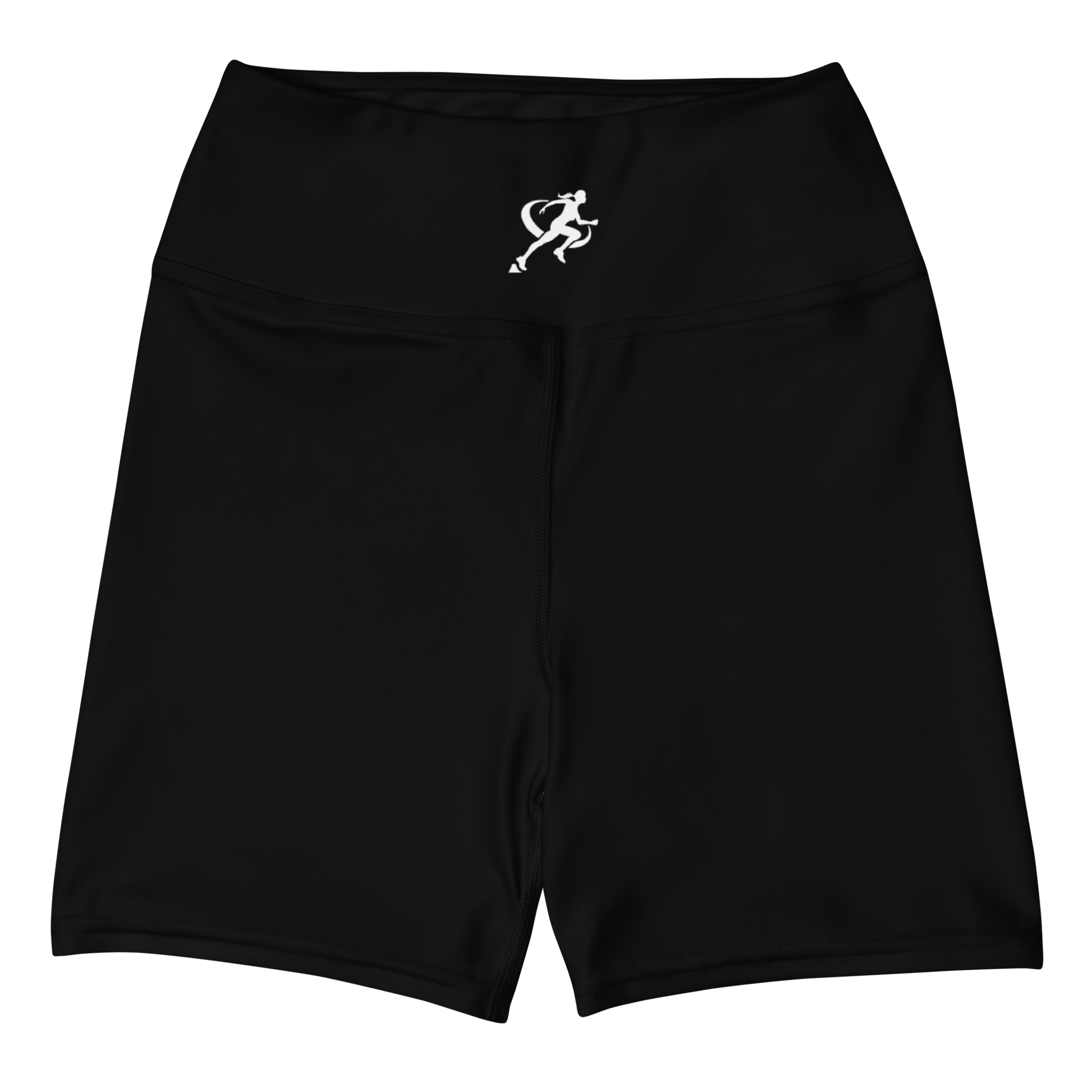 Woman in a yellow top and black shorts standing on sand with an orange sky