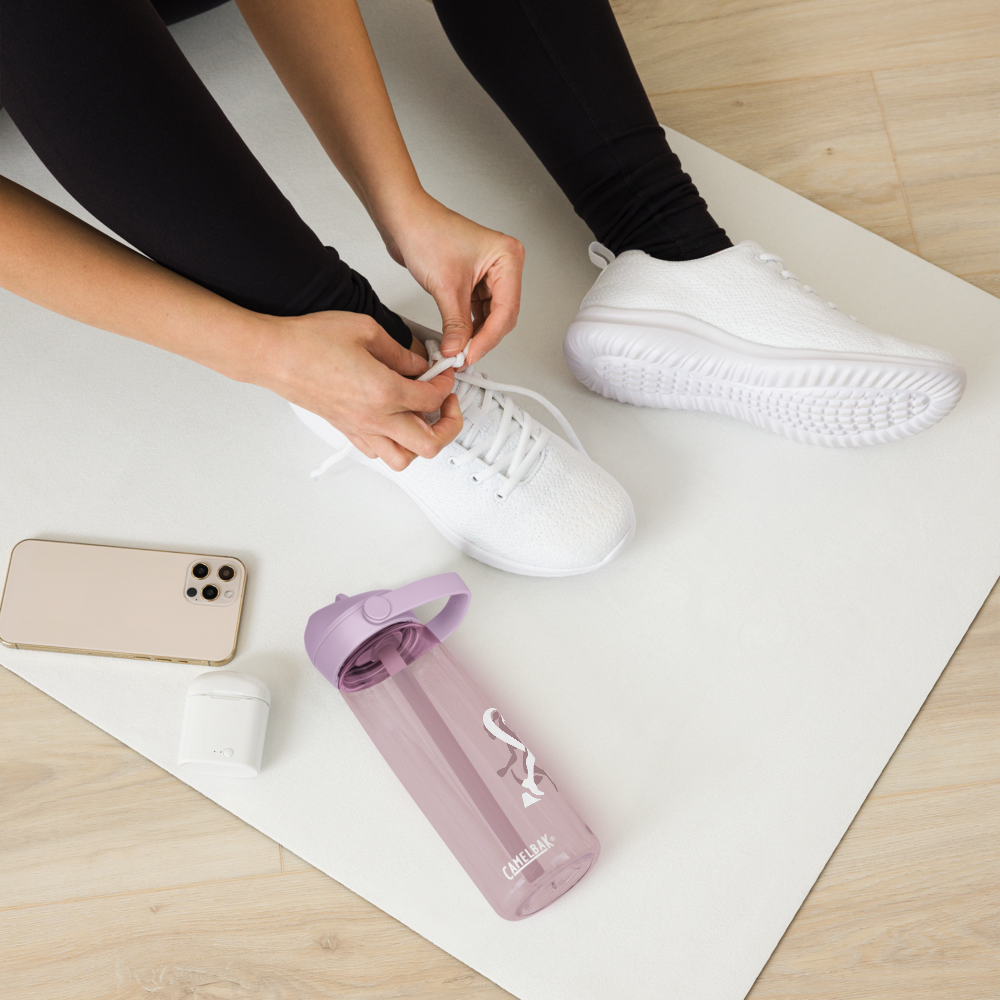 Clear water bottle with pink lid and running woman silhouette, surrounded by gym equipment on a light gray background.