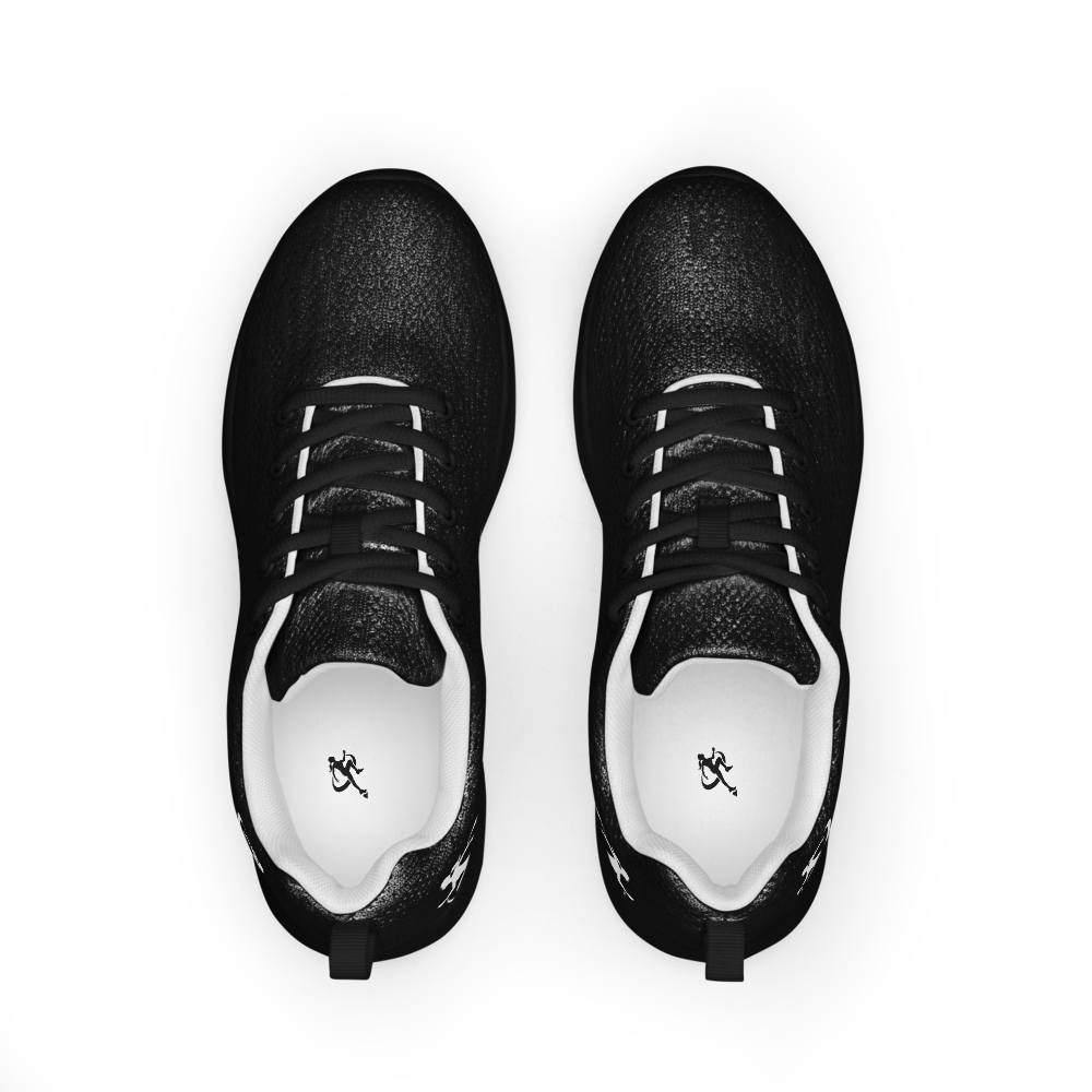 Black sneakers with white soles on a white background