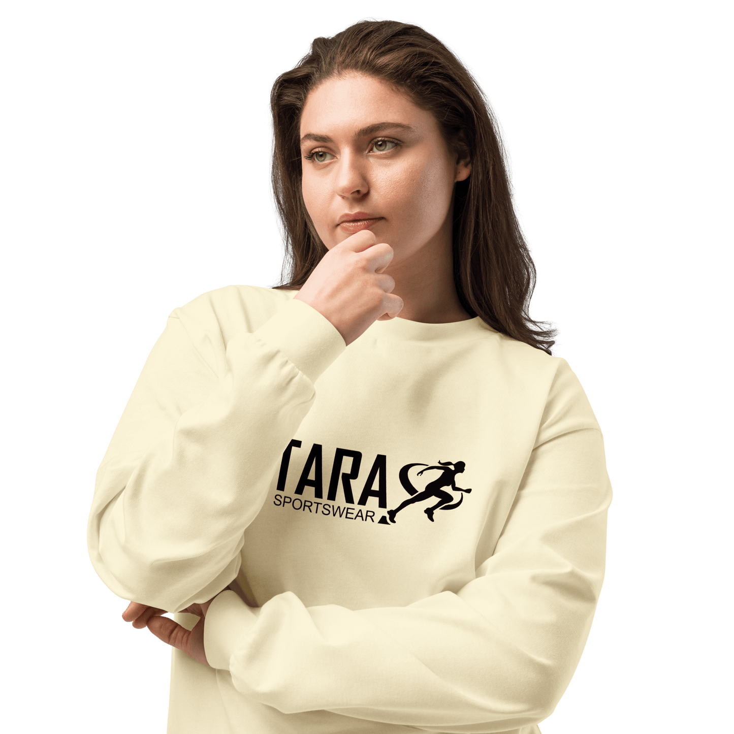 Person wearing a white sweatshirt with 'TARA SPORTSWEAR' logo against a brick wall.