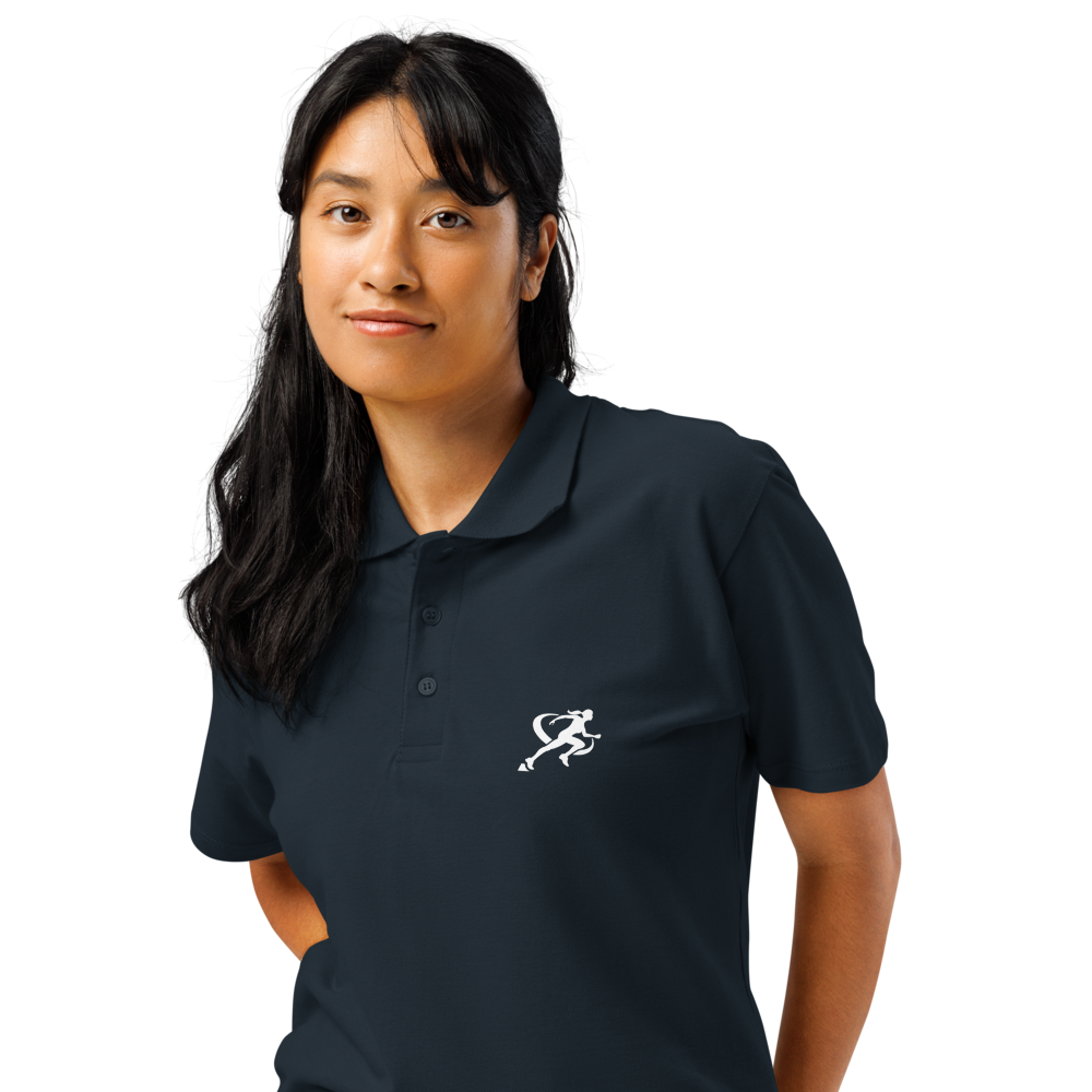 A person wearing a navy classic polo shirt with a three-button placket and a logo on the chest.