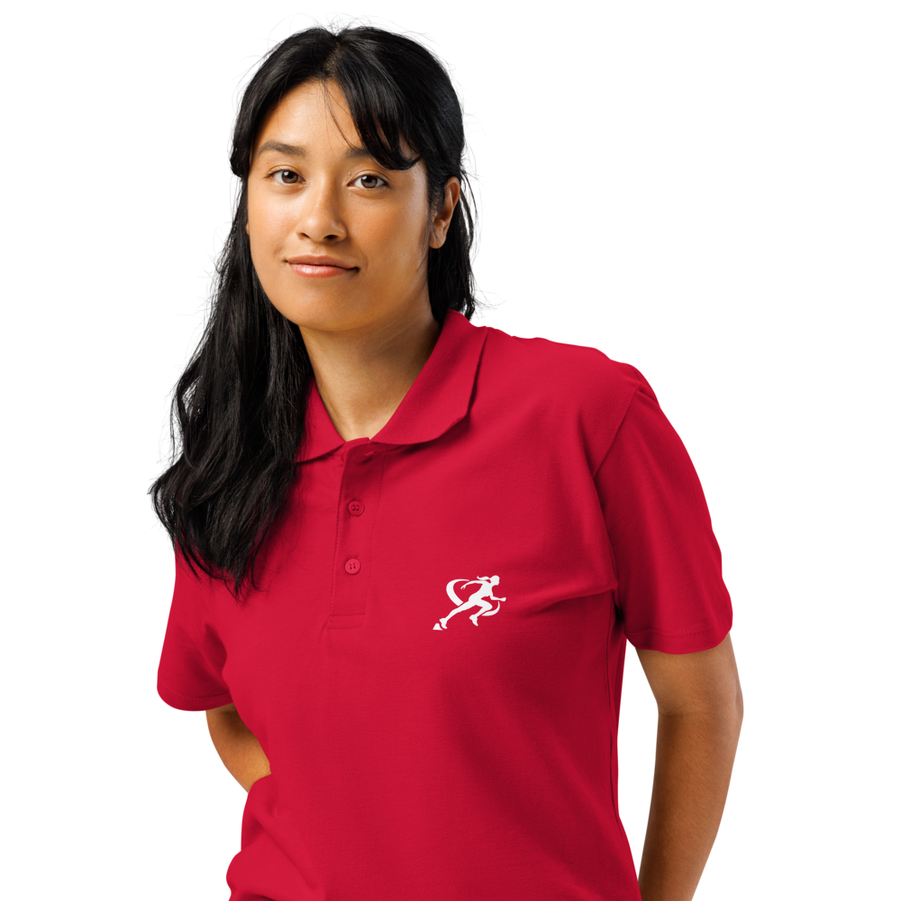 A person wearing a red classic polo shirt with a three-button placket and a logo on the chest.
