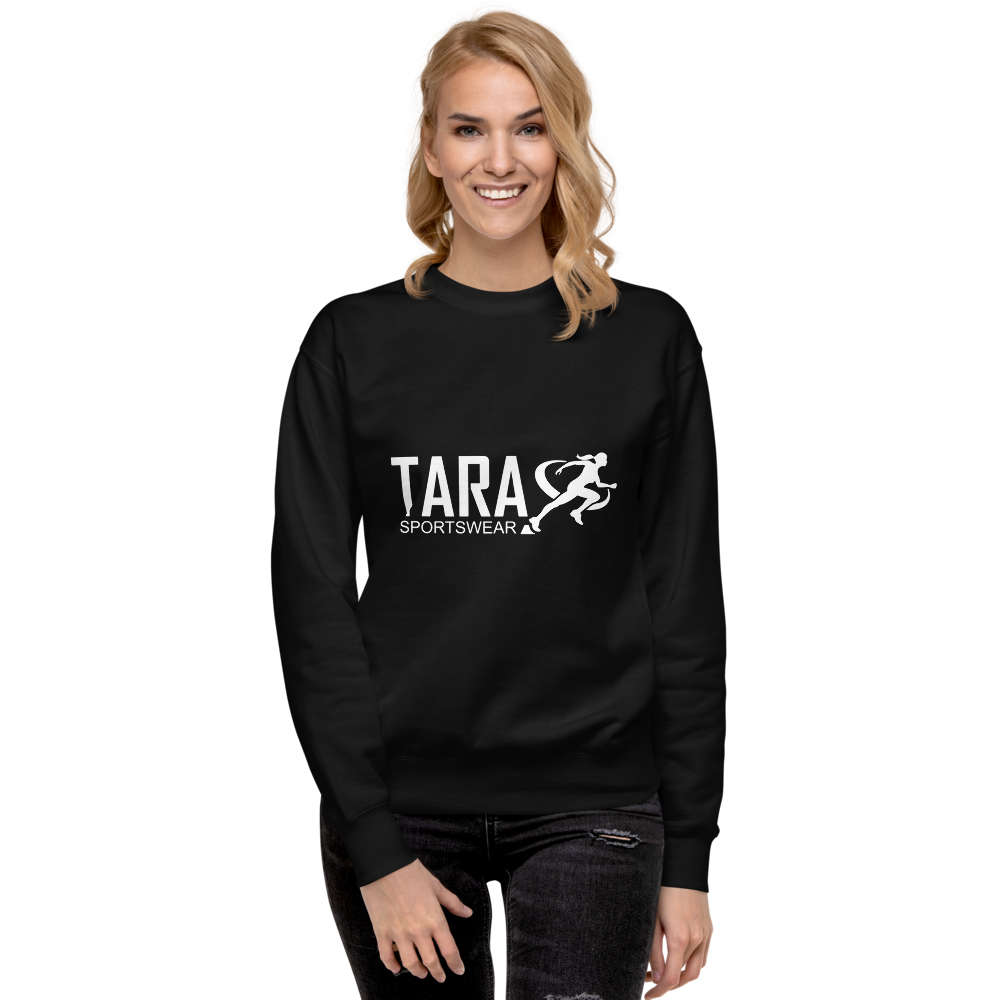 Person wearing a black sweatshirt with 'TARA SPORTSWEAR' logo on a white background