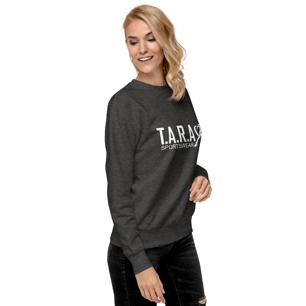 Person wearing a gray sweatshirt with 'TARA SPORTSWEAR' logo on a white background
