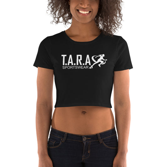 A woman is wearing a black crop top with the text 'T.A.R.A Sportswear' printed on the front.