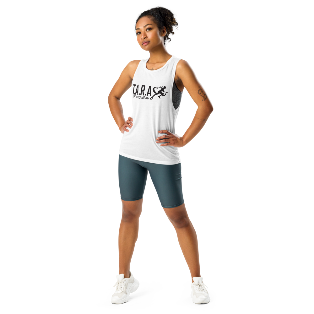 A women wearing a white TARA Sportswear tank top with a white background 